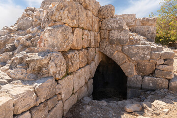 The dilapidated  entrance to the fortress wall in the medieval fortress of Nimrod - Qalaat al-Subeiba, located near the border with Syria and Lebanon on the Golan Heights, in northern Israel