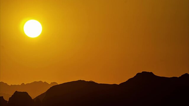 Golden sunset over the mountains in Egypt's Sinai - time lapse