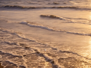 waves on the sand