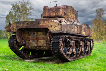 back view of rusty sherman tank, wwii armoured vehicle
