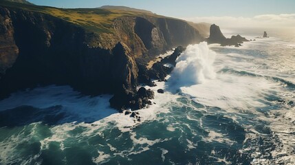 a wave crashing against a cliff