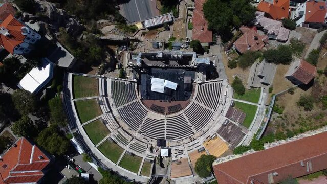 Aerial drone video of Roman Theatre of Philippopolis from above in Plovdiv, Bulgaria