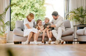 Family, tickle and play on couch, laughing and bonding at home, fun and silly humor or comedy. Parents and children, connection and security in relationship, happy and care on sofa, love and goofy