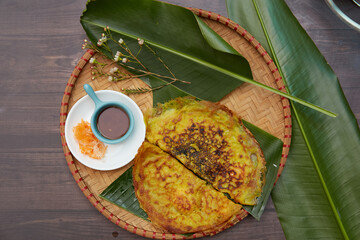 Vietnames Savory Crepe Banh xeos crepes with the sweet smell of turmeric, yellow soft flour and...