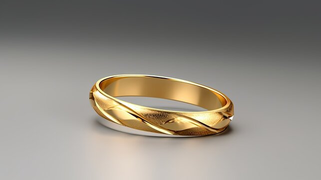 Gold wedding ring isolated on gray background