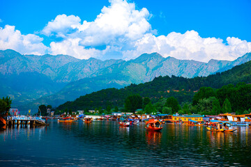 Dal Lake and the beautiful mountain range in the background in the city of Srinagar, Kashmir, India.