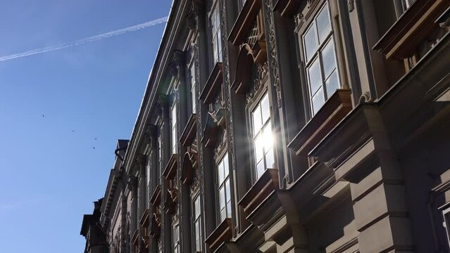 Timisoara architecture. 4K video with the beautiful reflection of sun in the windows of a landmark architecture building from Timisoara, Romania.