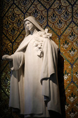 Notre Dame basilica, Alencon, Orne. St. Therese statue. - obrazy, fototapety, plakaty