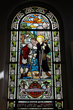 Saint Honore d'Eylau church, Paris, France. Stained glass. Saint Benedict Joseph Labre was a French mendicant, Franciscan tertiary, and Catholic saint in the 18th century...