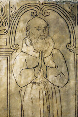 Relief depicting Constance de Paris capucine monk in Notre Dame collegiate church, Poissy, France