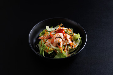 Japanese salad isolated in black background