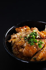 Grilled Chicken teriyaki rice Japanese food isolated in black background