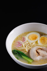 Ramen Japanese noodle isolated in black background