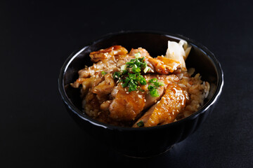 Grilled Chicken teriyaki rice Japanese food isolated in black background