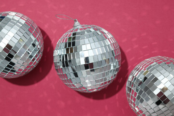 Beautiful disco balls on a red background