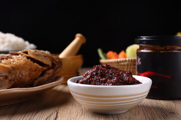 pork shrimp chilli dip local thai food sauce isolated in wood background