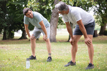 two sportsmen after running on the alley