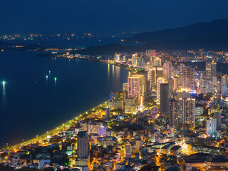 Nha Trang coastal city at night, with the famous and beautiful beaches and bays in Vietnam