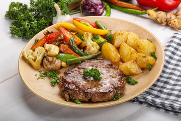 Roasted beef steak with potato