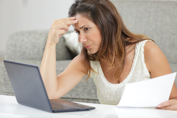 worried entrepreneur reading bad news on line