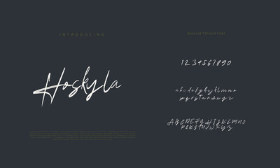 Obraz premium Handwritten Script font. Hand drawn brush style modern calligraphy cursive typeface. Hand Lettering and Custom Typography alphabet for Designs: Logo, Greeting Cards, Poster. Vector Brush type set. 