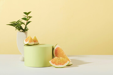 Pomelo is displayed on a round podium and table. Sophisticated space for displaying products...