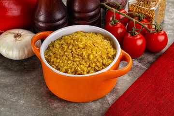 Dry wheat bulgur cereal heap