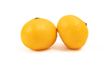 Two tangerines close-up on a white background