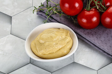 Dijon mustard sauce in the bowl
