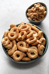 Bowl with taralli snack on the table.
