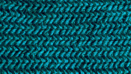 Texture of a crochet pattern made from turquoise wool yarn.