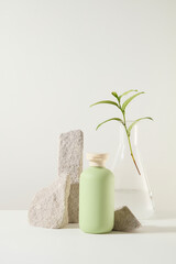 Minimal background for the presentation of products of green tea extract. Green beauty product...