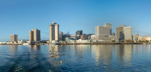 Fototapeta na wymiar scenic view to New Orleans skyline in morning light from river Mississippi, USA
