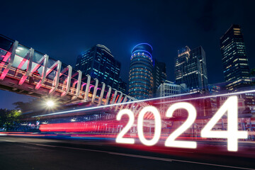 Number 2024 with blurred light trail and skyscrapers building in background