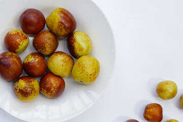 Fresh jujube fruit on white background