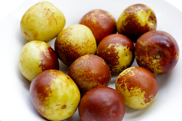 Fresh jujube fruit on white background