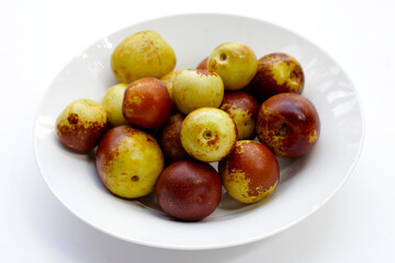Fresh jujube fruit on white background