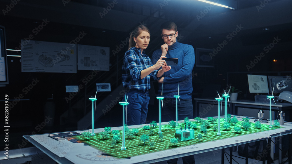 Wall mural renewable energy engineers design 3d wind turbine park using augmented reality software and smartpho