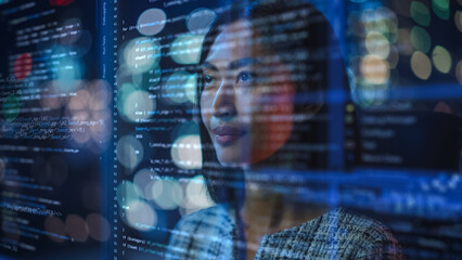 Portrait of Asian Female Startup Digital Entrepreneur Working on Computer, Line of Code Projected...