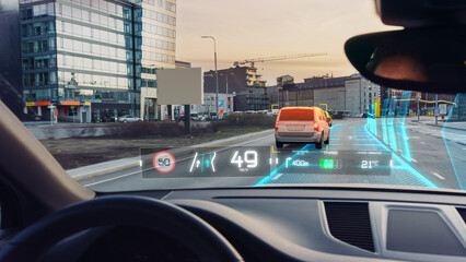 Futuristic Autonomous Self-Driving Car Moving in the City, Head-up Display Showing Infographics: Speed, Distance, Navigation. Road Scanning Concept. View From Driver Seat / First Person View FPV.
