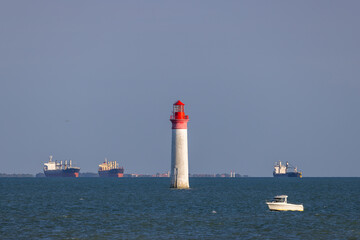 Phare de Chauvea near Ile de Re with ships to La Rochelle, Pays de la Loire, France