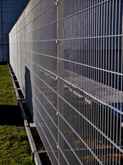 strong galvanized welded mesh fencing is used around industrial halls and logistics centers and...