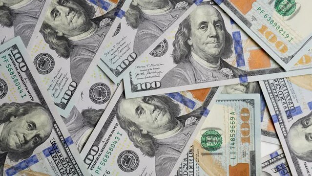 American one hundred dollar paper money moving close-up