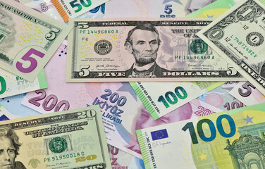 Fototapeta na wymiar Images of various banknotes. US dollar, Turkish lira and euro photos.