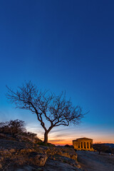 Concord temple at dusk. Valley of the Temples archaeological park, Agrigento / Sicily IT	