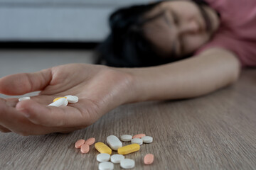 asian woman use pills overdose, stressed, sad, drug abuser, drug addict, sick, unhealthy, unhappy,...