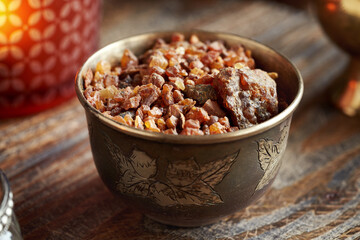 Myrrh resin in a bowl - ingredient for essential oils