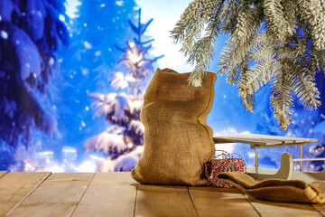 Desk of free space and winter background of pedestal. Christmas time and snow with forst...