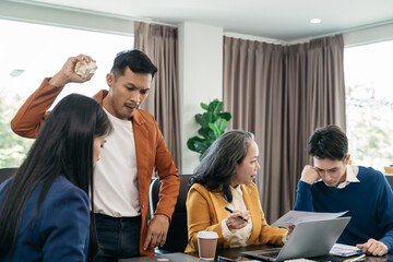 business team sitting sad and solving problems in the office. Failed teamwork concept
