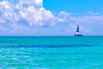 Boats yachts catamaran jetty ferry Playa del Carmen Cozumel Mexico.